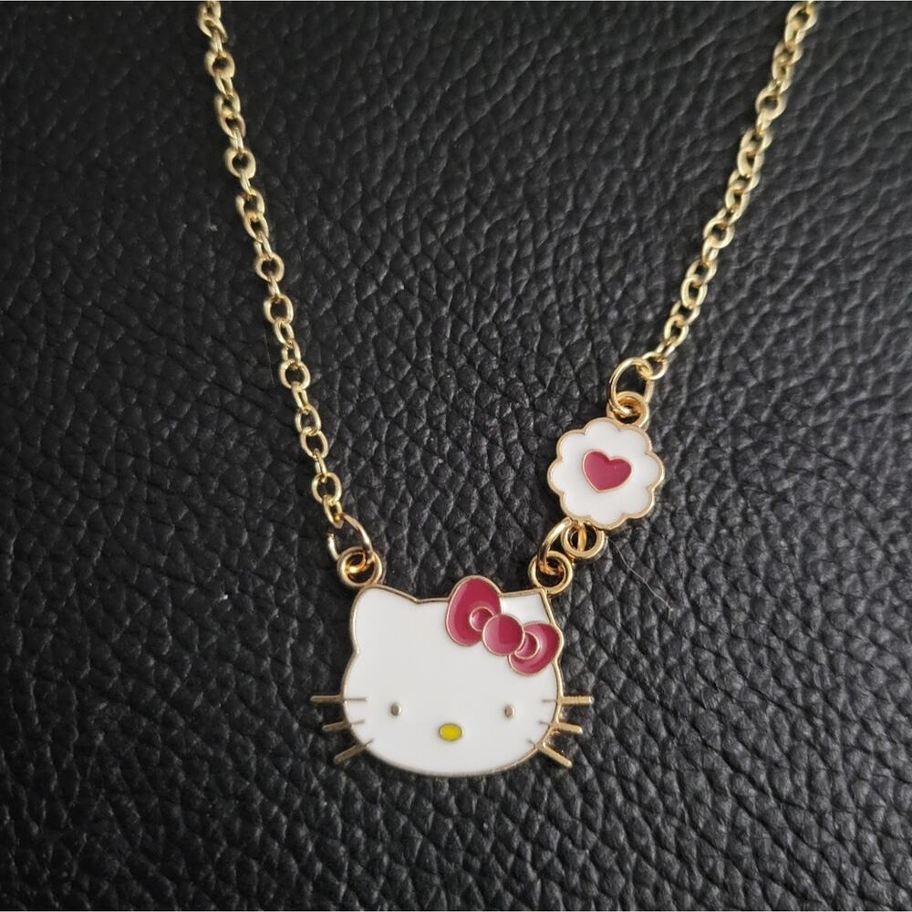 Sanrio Hello Kitty gold ton charm necklace with heart love charm